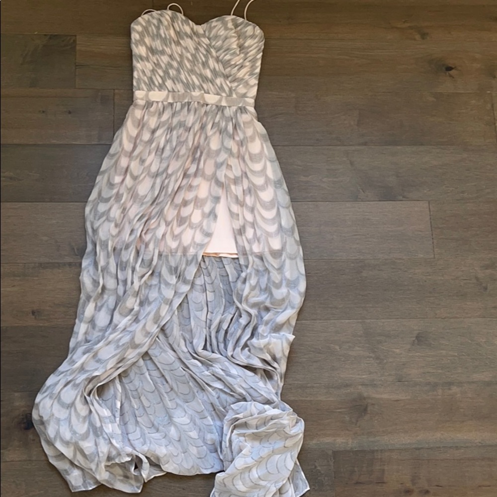 Maxi dress with light pink fitted dress underneath